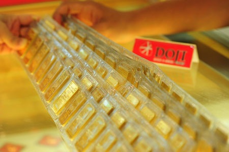 Vàng giảm chiều mua, tăng chiều bán, chênh lệch thu hẹp - 1 Vàng giao dịch dưới mốc 38 triệu đồng/lượng (ảnh: AH).