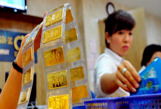Chênh lệch giá vàng "ì ạch" giảm - 1 Giá vàng SJC vẫn rất đắt so với giá thế giới (ảnh minh họa).