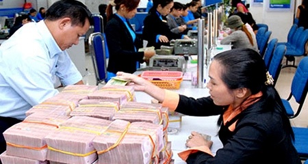 Lãi suất các khoản vay cũ đã về dưới 13%/năm - 1 Mặt bằng lãi suất đang giảm mạnh (ảnh minh họa).