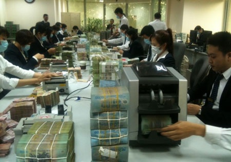 Ngân hàng cấp tập báo lãi, công bố nợ xấu “dưới chuẩn” - 1 Lợi nhuận ngân hàng 6 tháng đầu năm 2013 đang dần hé lộ (ảnh: AH).