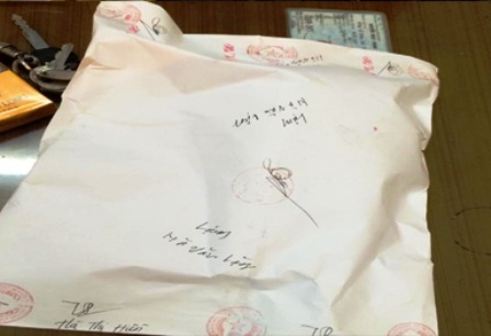 Sang Lào mua thuốc phiện về bán kiếm lời - 1 Tang vật vụ án.