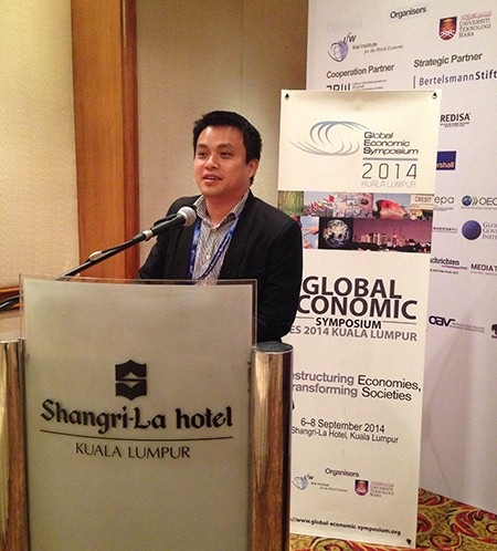 TS. Phạm Minh Tuấn phát biểu tại Hội nghị Kinh tế toàn cầu 2014, Kuala Lumpur, Malaysia.