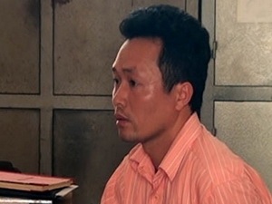 Bắt vợ chồng giáo viên giết chủ nợ - 1 Nguyễn Quang Hiệp tại cơ quan điều tra (ảnh: nguồn VTC)