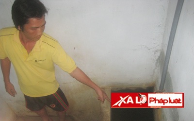 Lai lịch kinh hồn của ông bố dìm chết con trong bể nước - 1 Hàng xóm chỉ nơi người cha dìm chết con gái chưa đầy 6 tháng tuổi