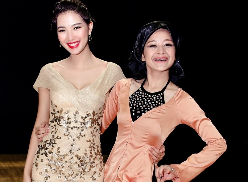 Phạm Mỹ Linh (trái) sinh
năm 1991, từng là người mẫu ảnh “đắt show” 