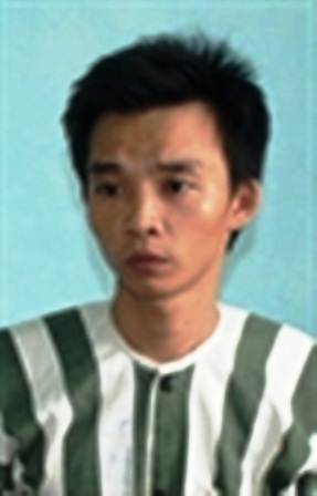 Tuấn - tên tình nhân khát máu tại cơ quan điều tra (ảnh: báo PL&XH)