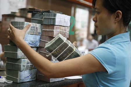 Nới nhẹ sức căng của lãi suất  - 1