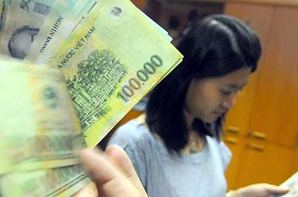 Chính thức miễn thuế cho người thu nhập dưới 9 triệu đồng - 1