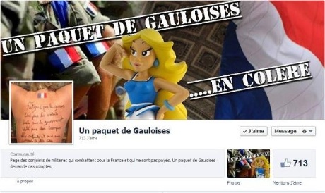 Thi nhau chụp ảnh nude để giúp chồng đòi lương - 1 Chụp ảnh lưng trần để tham gia chiến dịch trên Facebook nhằm giúp chồng đòi lương.