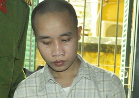 Đối tượng Tuấn Anh tại cơ quan điều tra (Ảnh: Bưu điện VN)