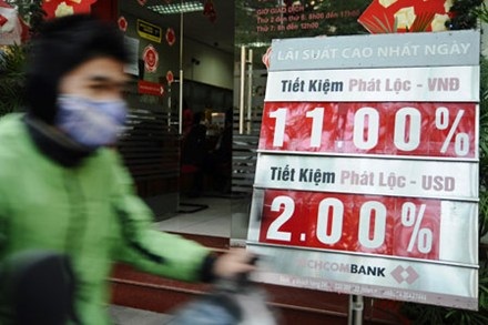 Nhiều ngân hàng thương mại cổ phần có dấu hiệu vi phạm quy định về trần lãi suất. Ảnh: Giang Huy