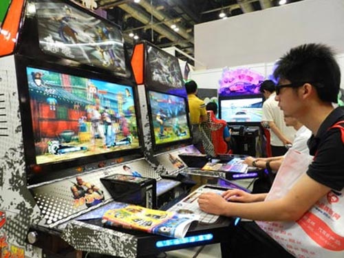 Cha thuê sát thủ “giết" con trong game - 1 Game trực tuyến được chơi tại một cuộc triển lãm ở Trung Quốc. Ảnh: THX