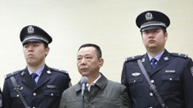 Lật mặt tỷ phú mafia Trung Quốc - 1 Lưu Hán tại phiên tòa. Ảnh: SCMP