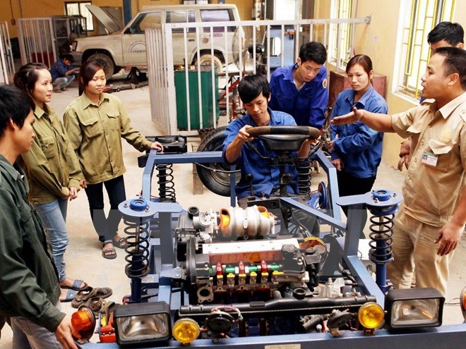 Đài Loan dự định dỡ bỏ lệnh cấm tiếp nhận lao động Việt Nam - 1 Đào tạo công nhân đi xuất khẩu lao động. (Ảnh: Anh Tuấn/TTXVN)