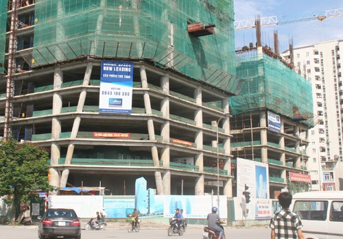 Văn phòng hạng A thành nhà trọ công nhân, quán trà đá - 10 Nhiều tòa nhà văn phòng không thể hoàn thành, trở thành những cao ốc bỏ hoang.