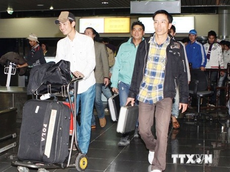 Đã có phương án bảo đảm an toàn cho 1.550 lao động Việt ở Libya - 1 Lao động Việt Nam hết hạn hợp đồng trở về nước. (Ảnh: Hữu Việt/TTXVN)
