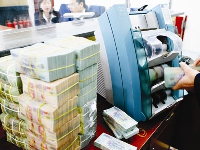 Món “nợ đồng lần” giữa các ngân hàng - 1 Món “nợ đồng lần” giữa các ngân hàng - 1