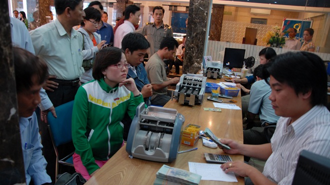 Sau 25/11, vốn vàng trong dân đi đâu? - 1 Mua bán vàng miếng tại Công ty Vàng bạc đá quý Sài Gòn (SJC)