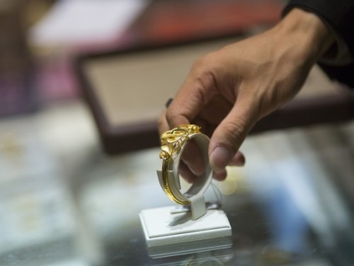 Giá vàng có thể xuống dưới 1.125 USD/ounce vào tháng tới - 1 Giá vàng có thể xuống dưới 1.125 USD/ounce vào tháng tới