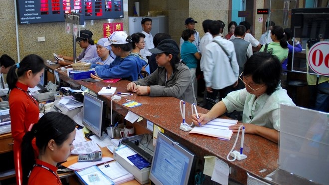 Vốn ngân hàng đổ mạnh vào trái phiếu - 1 Thừa vốn, bí đầu ra đang là tình trạng của các ngân hàng hiện nay. Ảnh: như ý