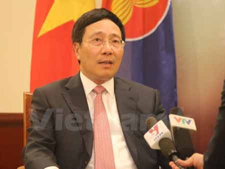 Phó Thủ tướng, Bộ trưởng Ngoại giao Phạm Bình Minh trả lời phỏng vấn. (Ảnh: Chí Giáp/Vietnam+)