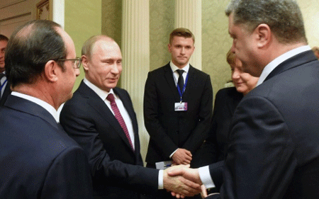 EU cần dỡ bỏ lệnh trừng phạt Nga nếu thỏa thuận Minsk được thực thi - 1 Lãnh đạo Pháp, Nga, Đức và Ukraine tại Hội nghị Minsk (Ảnh AP)