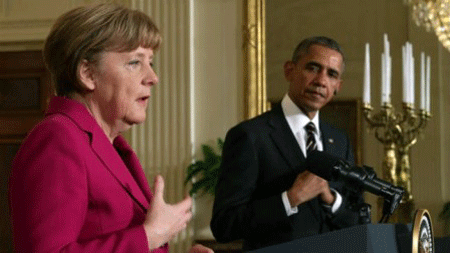 Thủ tướng Đức Merkel (trái)