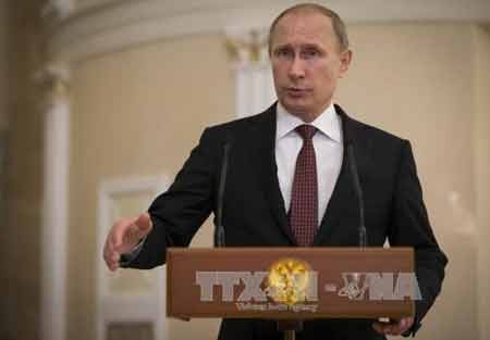 Ukraine thừa nhận ông Putin là nhà đàm phán kiên quyết - 1 Ông Putin thông báo với phóng viên về kết quả đàm phán (Ảnh: AFP/TTXVN)