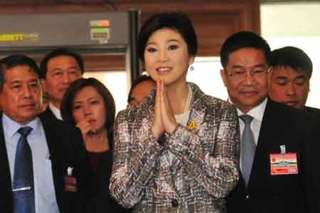 Cựu Thủ tướng Thái Lan Yingluck Shinawatra bị buộc tội - 1 Cựu Thủ tướng Thái Lan Yingluck Shinawatra tới tòa nhà Quốc hội. Ảnh: THX/TTXVN