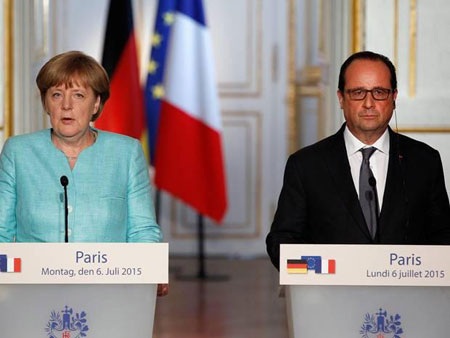 Cánh cửa đàm phán vẫn để ngỏ cho Hy Lạp - 1 Tổng thống Pháp François Hollande và Thủ tướng Đức Angela Merkel tại cuộc họp báo tối 6-7. (Ảnh: