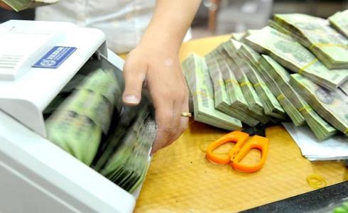Nhà băng dè dặt công bố kế hoạch lợi nhuận 2015 - 1 Nhà băng dè dặt công bố lợi nhuận.