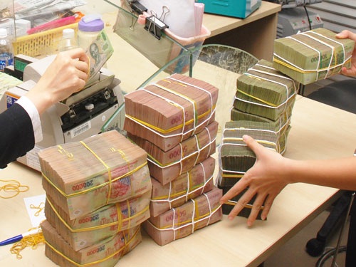 Năm 2014, VAMC xử lý được hơn 4.000 tỷ đồng nợ xấu - 1 Năm 2014, VAMC xử lý được hơn 4.000 tỷ đồng nợ xấu