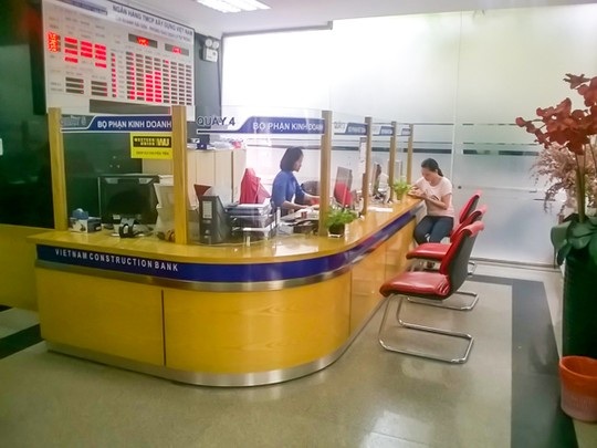 Ngân hàng Nhà nước mua lại Ngân hàng Xây dựng với giá... 0 đồng - 1 Một phòng giao dịch của Ngân hàng Xây dựng.