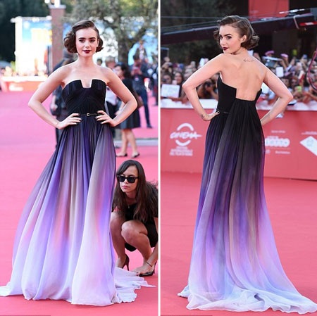 Lily tạo dáng đầy thu hút và tự tin trên thảm đỏ.