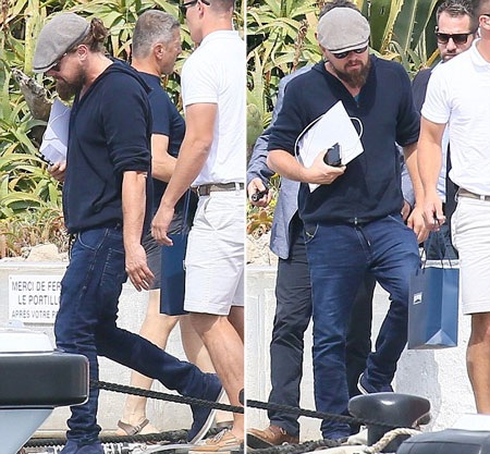 Tài tử Leonardo DiCaprio “phớt lờ” thảm đỏ Cannes - 8 Tài tử 40 tuổi đang trò chuyện với một cô gái tóc vàng lạ mặt