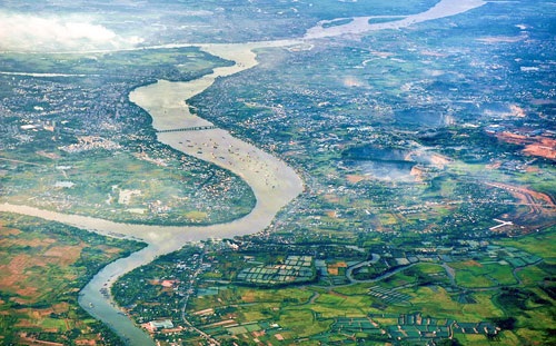 Lấp sông Đồng Nai là vi phạm nghiêm trọng Luật Tài nguyên nước - 2 Sau
6 tháng thực hiện dự án, hiện diện tích sông được lấp gần đạt 90% theo thiết kế.