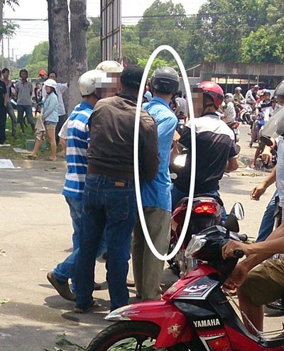 Những đối tượng gây rối (trong vòng tròn trắng) bắt đầu được đưa ra xét xử từ ngày 25/5