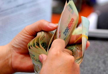 Trả lương chậm quá 15 ngày, chủ sử dụng lao động phải trả thêm tiền - 1 (Ảnh minh hoạ: Lao động).