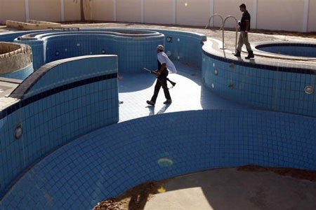 Khám phá cuộc sống của ông Gadhafi - 16