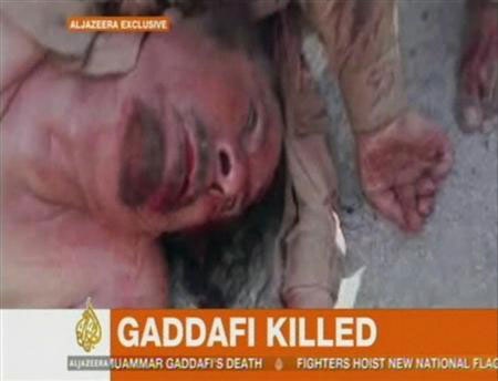 Gia đình Gadhafi đòi xác, NATO kết thúc chiến sự - 1 Gia đình Gadhafi đòi xác, NATO kết thúc chiến sự - 1