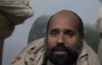 Video con trai Gadhafi cảnh báo những người bắt giữ mình - 1