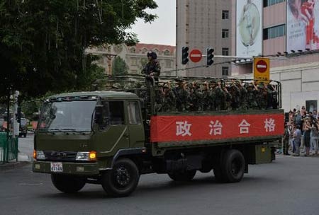 Trung Quốc: Đụng độ ở Tân Cương, 16 người chết - 1 Lực lượng bán quân sự Trung Quốc tại Tân Cương.
