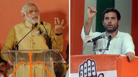 Ông Narendra Modi, đại diện cho đảng BJP (trái) và Rajiv Shukla, đại diện cho đảng Quốc đại.