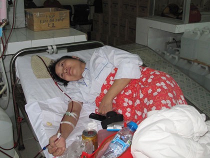 Một số đối tượng hộ cận nghèo sẽ được hỗ trợ 100% mức đóng thẻ BHYT. Ảnh minh họa: H.Hải