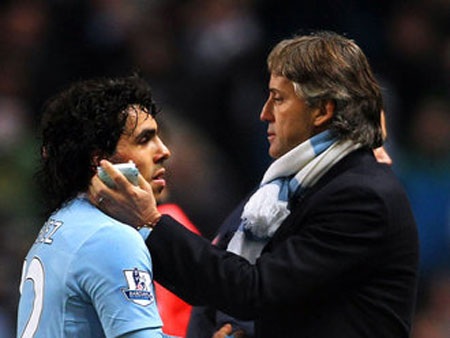 HLV Mancini bất ngờ muốn giữ lại Tevez - 1