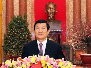 "Các nhà khoa học đóng góp hơn nữa cho đất nước" - 1 Chủ tịch nước Trương Tấn Sang chúc Tết. (Ảnh: Nguyễn Khang/TTXVN)