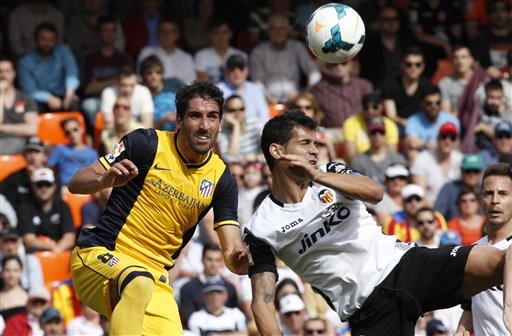 Hạ gục Valencia, Atletico tiến sát đến chức vô địch La Liga - 1 Atletico (vàng) giành chiến thắng quan trọng trước Valencia