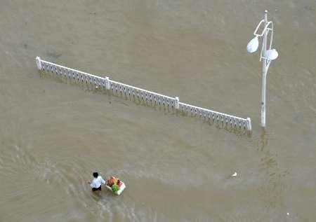 Chùm ảnh: Bão Morakot và 1001 cách "nổi" trên mặt nước - 14