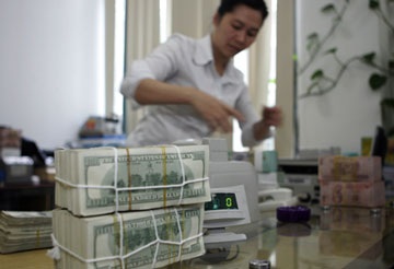 Tăng tỷ giá liên ngân hàng lên 20.693 VND, thu hẹp biên độ +/-1% - 1 Tăng tỷ giá liên ngân hàng lên 20.693 VND, thu hẹp biên độ +/-1% - 1