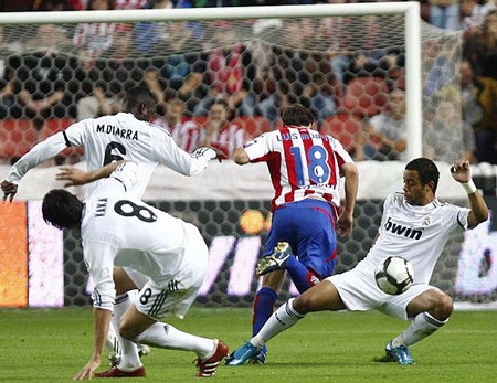 Real Madrid chia điểm thất vọng trước Sporting Gijon - 2